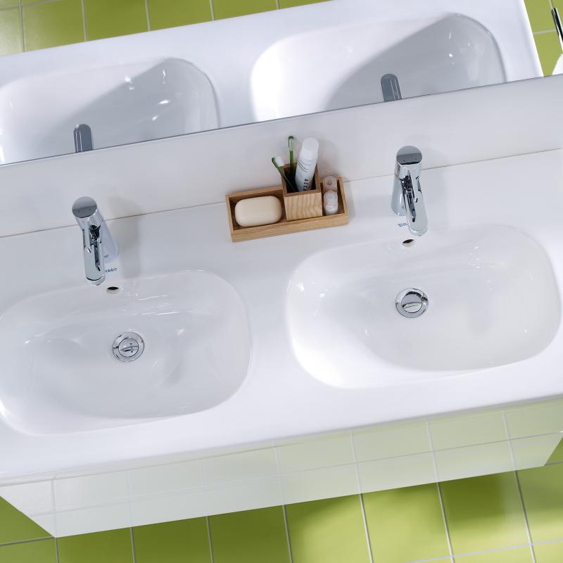 Immagine di Duravit D-CODE lavabo consolle doppio, due fori per rubinetteria, con troppopieno e bordo per rubinetteria, lato inferiore smaltato, colore bianco 03481200002