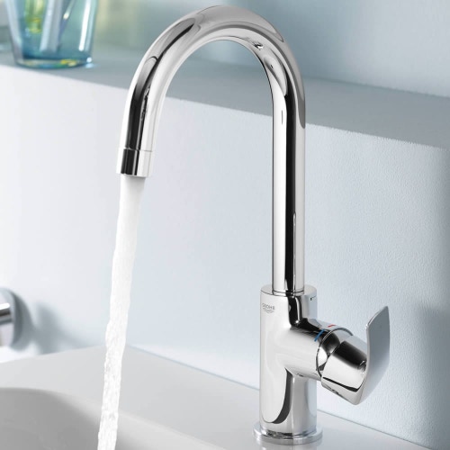 Immagine di Grohe EUROSMART miscelatore monocomando H.31 cm per lavabo, con scarico e tecnologia Grohe SilkMove, finitura cromo 23537002
