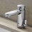 Immagine di Grohe EUROSMART COSMOPOLITAN T miscelatore H.13 cm per lavabo, con autochiusura a tempo e limitatore di temperatura regolabile, senza scarico, finitura cromo 36317000