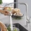 Immagine di Grohe Essence New miscelatore monocomando Lavello, bocca alta, raggio di rotazione di 360°, pratica doccetta estraibile in metallo, finitura opaca 30270DC0