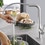Immagine di Grohe Essence New miscelatore monocomando Lavello, bocca alta, raggio di rotazione di 360°, pratica doccetta estraibile in metallo, finitura opaca 30270DC0