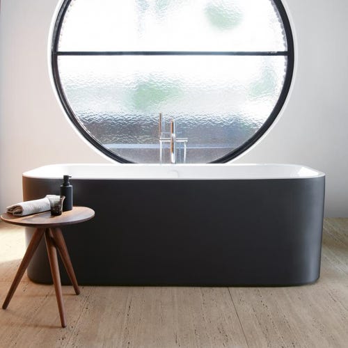 Immagine di Duravit HAPPY D.2 PLUS vasca centro stanza, con due schienali inclinati, con pannello in acrilico integrato e piedi, interno colore bianco finitura lucido, esterno colore grigio grafite finitura opaco 700453800000000