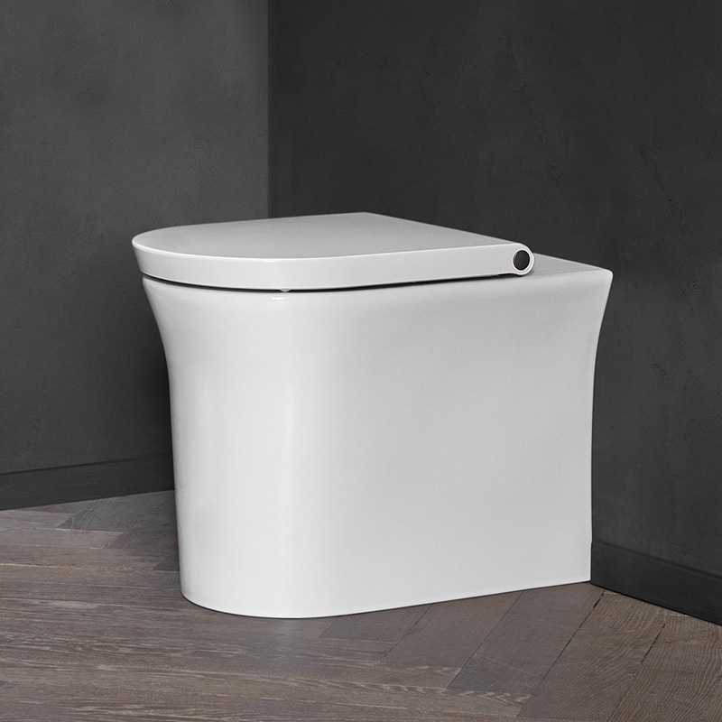 Immagine di Duravit WHITE TULIP vaso a pavimento, a filo parete, Rimless®, con scarico orizzontale, UWL classe 1, senza sedile, Wondergliss, colore bianco 20010900001