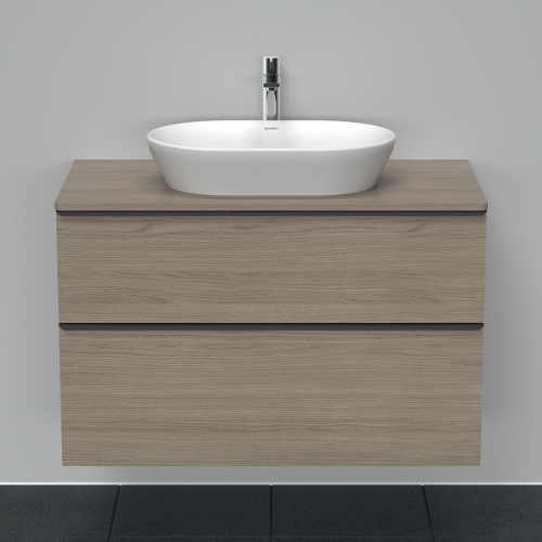 Immagine di Duravit D-NEO composizione bagno: mobile sottolavabo sospeso, finitura rovere terra + specchio Ø 70 con illuminazione, versione "Good" + lavabo da appoggio 60 cm, colore bianco + miscelatore monocomando L, finitura cromo LM785100000+DE496803535