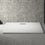 Immagine di Ideal Standard ULTRAFLAT NEW piatto doccia rettangolare L.140 P.90 cm, in acrilico, colore bianco finitura lucido T448401