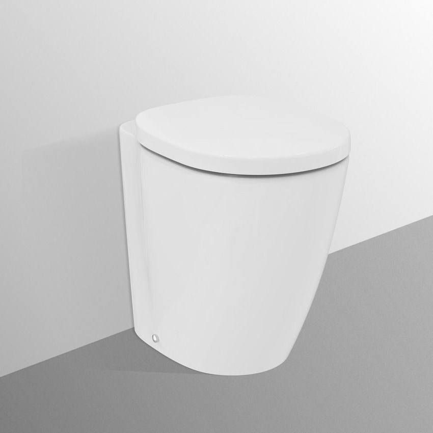 Immagine di Ideal Standard CONNECT FREEDOM vaso a pavimento per installazione filo parete, con sedile a chiusura rallentata, colore bianco finitura lucido E828501