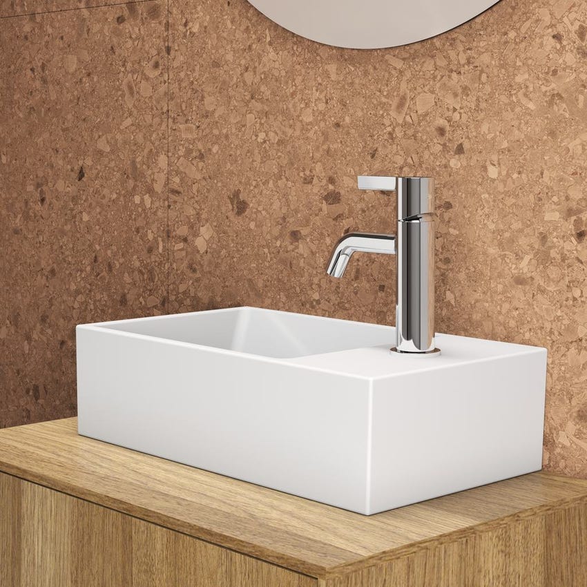 Immagine di Ideal Standard EXTRA lavamani asimmetrico sospeso o da appoggio L.45 cm, monoforo a destra, con troppopieno, colore bianco T373401