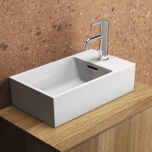 Immagine di Ideal Standard EXTRA lavamani asimmetrico sospeso o da appoggio L.45 cm, monoforo a destra, con troppopieno, colore bianco T373401