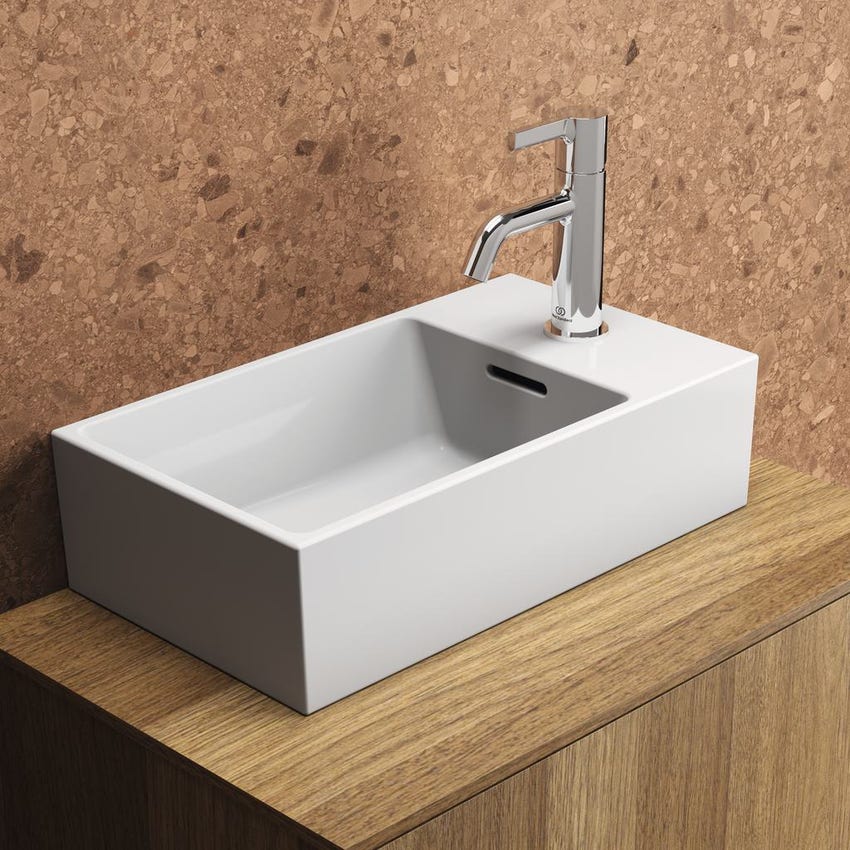 Immagine di Ideal Standard EXTRA lavamani asimmetrico sospeso o da appoggio L.45 cm, monoforo a destra, con troppopieno, colore bianco T373401