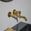 Immagine di Ideal Standard JOY miscelatore monocomando lavabo a parete P.22 cm, finitura brushed gold A7379A2