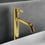 Immagine di Ideal Standard JOY miscelatore monocomando lavabo da appoggio H.31 cm, con scarico, finitura brushed gold BC781A2