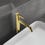 Immagine di Ideal Standard JOY miscelatore monocomando lavabo da appoggio H.31 cm, con scarico, finitura brushed gold BC781A2