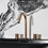 Immagine di Ideal Standard JOY miscelatore monocomando lavabo 3 fori, con scarico, finitura brushed gold BC783A2