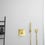 Immagine di Ideal Standard Gomito a muro con valvola di ritegno e con connessione G1/2", finitura brushed gold BC772A2