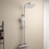 Immagine di Ideal Standard CERATHERM T100 colonna doccia con termostatico esterno, doccetta Idealrain con riduttore di portata, soffione quadrato 20 cm, asta murale e tubo flessibile L.175 cm, finitura cromo A7240AA
