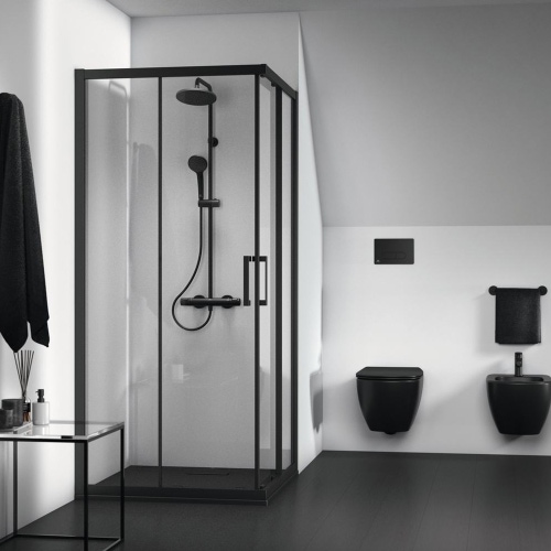 Immagine di Ideal Standard CERATHERM T25 colonna doccia con termostatico esterna, asta murale, soffione Ø 20 cm, supporto doccetta con scorrimento a pressione, doccetta Idealrain e flessibile L.175 cm, colore nero seta finitura opaco A7545XG