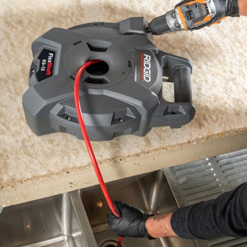 Immagine di Ridgid Kit composto da FlexShaft K9-12 stasatrice per pulizia da parete a parete 1 1/4"-2", testa di penetrazione a sfera per K9-10 per tubi 40-50 mm e demolitore FlexShaft K9-102, per tubi 50 mm 76188+71838+64298