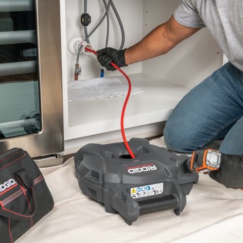 Immagine di Ridgid Kit composto da FlexShaft K9-12 stasatrice per pulizia da parete a parete 1 1/4"-2", testa di penetrazione a sfera per K9-10 per tubi 40-50 mm e demolitore FlexShaft K9-102, per tubi 50 mm 76188+71838+64298