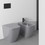 Immagine di Ideal Standard I.LIFE B set sanitari a terra, vaso filo parete senza brida, con sedile avvolgente a discesa rallentata, bidet monoforo con troppopieno, colore grigio finitura lucido T461658+T500358+T461758