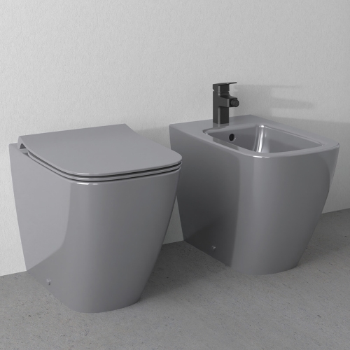 Immagine di Ideal Standard I.LIFE B set sanitari a terra, vaso filo parete senza brida, con sedile avvolgente a discesa rallentata, bidet monoforo con troppopieno, colore grigio finitura lucido T461658+T500358+T461758