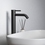 Immagine di Ideal Standard CERALINE miscelatore monocomando H.31 cm per lavabo, senza asta di comando e scarico piletta, con sistema BlueStart, colore nero finitura opaco BD762XG
