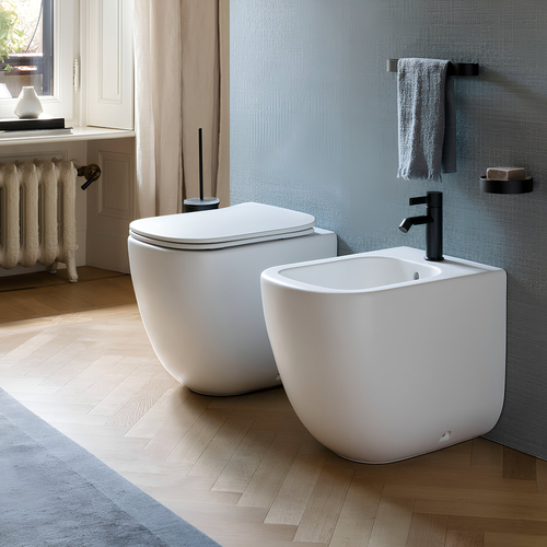 Immagine di Cielo ERA set completo sanitari a pavimento vaso rimless, sedile a discesa rallentata, bidet monoforo con troppopieno, colore talco finitura opaco ERVAKTL+CPVERTFTL+ERBITL