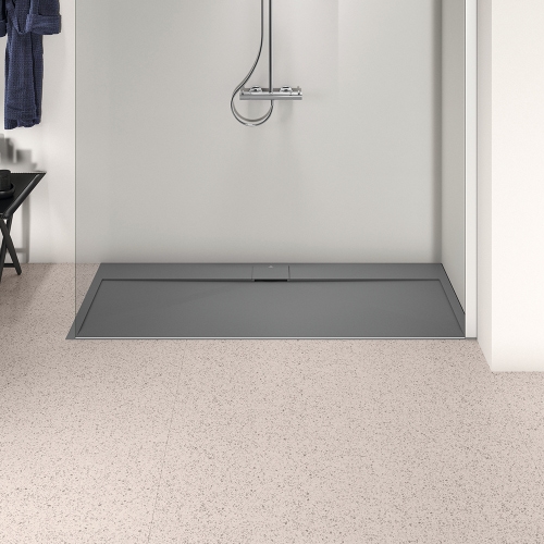 Immagine di Ideal Standard ULTRA FLAT S I.LIFE piatto doccia rettangolare L.170 P.70 cm, antiscivolo e con scarico nascosto sul lato lungo, in IdealSolid+, effetto pietra, colore grigio cemento finitura opaco T5244FS