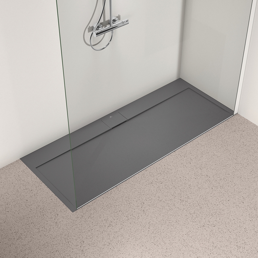 Immagine di Ideal Standard ULTRA FLAT S I.LIFE piatto doccia rettangolare L.170 P.70 cm, antiscivolo e con scarico nascosto sul lato lungo, in IdealSolid+, effetto pietra, colore grigio cemento finitura opaco T5244FS