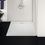 Immagine di Ideal Standard ULTRA FLAT S I.LIFE piatto doccia quadrato 120 cm, antiscivolo e con scarico nascosto, in IdealSolid+, effetto pietra, colore bianco finitura opaco T5242FR