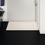 Immagine di Ideal Standard ULTRA FLAT S I.LIFE piatto doccia rettangolare L.120 P.70 cm, antiscivolo e con scarico nascosto sul lato corto, in IdealSolid+, effetto pietra, colore sabbia finitura opaco T5233FT
