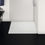 Immagine di Ideal Standard ULTRA FLAT S I.LIFE piatto doccia rettangolare L.100 P.80 cm, antiscivolo e con scarico nascosto sul lato corto, in IdealSolid+, effetto pietra, colore bianco finitura opaco T5223FR