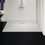 Immagine di Ideal Standard ULTRA FLAT S I.LIFE piatto doccia rettangolare L.180 P.100 cm, antiscivolo e con scarico nascosto sul lato lungo, in IdealSolid+, effetto pietra, colore bianco finitura opaco T5245FR