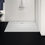 Immagine di Ideal Standard ULTRA FLAT S I.LIFE piatto doccia rettangolare L.140 P.80 cm, antiscivolo e con scarico nascosto sul lato lungo, in IdealSolid+, effetto pietra, colore bianco finitura opaco T5224FR