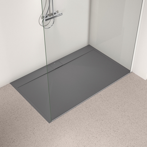 Immagine di Ideal Standard ULTRA FLAT S I.LIFE piatto doccia rettangolare L.160 P.100 cm, antiscivolo e con scarico nascosto sul lato lungo, in IdealSolid+, effetto pietra, colore grigio cemento finitura opaco T5232FS