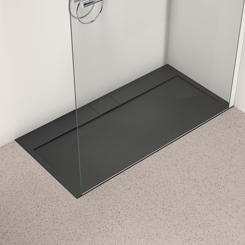 Immagine di Ideal Standard ULTRA FLAT S I.LIFE piatto doccia rettangolare L.140 P.70 cm, antiscivolo e con scarico nascosto sul lato lungo, in IdealSolid+, effetto pietra, colore nero finitura opaco T5241FV
