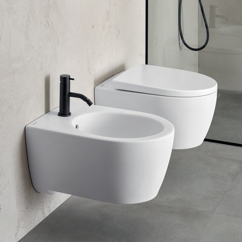 Immagine di Geberit ICON set sanitari sospesi, vaso RIMFREE, con sedile a chiusura ammortizzata, bidet monoforo con troppopieno, colore bianco finitura lucido 501.663.00.1-501.898.00.1