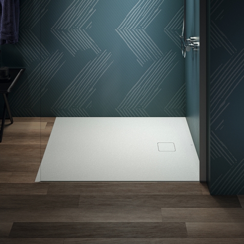 Immagine di Ideal Standard ULTRA FLAT EVO piatto doccia rettangolare L.120 P.100 cm, installazione sopra pavimento o filo pavimento, in StoneTech, antiscivolo, con scarico sul lato corto, colore bianco seta finitura opaco T5437FO