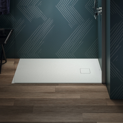 Immagine di Ideal Standard ULTRA FLAT EVO piatto doccia rettangolare L.120 P.70 cm, installazione sopra pavimento o filo pavimento, in StoneTech, antiscivolo, con scarico sul lato corto, colore bianco seta finitura opaco T5440FO