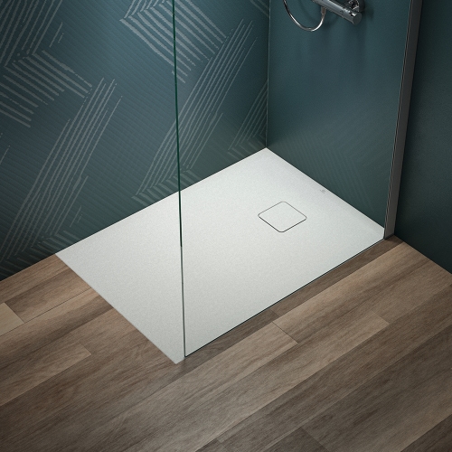 Immagine di Ideal Standard ULTRA FLAT EVO piatto doccia rettangolare L.100 P.70 cm, installazione sopra pavimento o filo pavimento, in StoneTech, antiscivolo, con scarico sul lato corto, colore bianco seta finitura opaco T5443FO