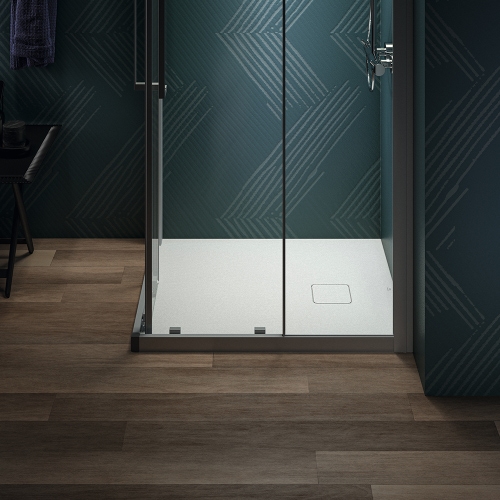 Immagine di Ideal Standard ULTRA FLAT EVO piatto doccia rettangolare L.90 P.75 cm, installazione sopra pavimento o filo pavimento, in StoneTech, antiscivolo, con scarico sul lato corto, colore bianco seta finitura opaco T5445FO