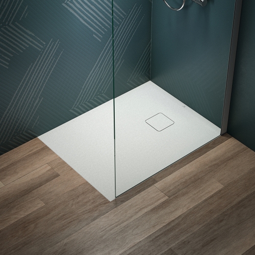 Immagine di Ideal Standard ULTRA FLAT EVO piatto doccia rettangolare L.90 P.70 cm, installazione sopra pavimento o filo pavimento, in StoneTech, antiscivolo, con scarico sul lato corto, colore bianco seta finitura opaco T5446FO