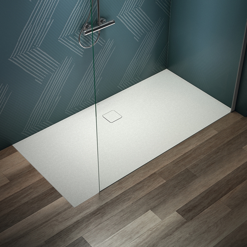 Immagine di Ideal Standard ULTRA FLAT EVO piatto doccia rettangolare L.180 P.90 cm, installazione sopra pavimento o filo pavimento, in StoneTech, antiscivolo, con scarico sul lato lungo, colore bianco seta finitura opaco T5428FO