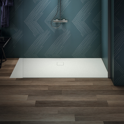 Immagine di Ideal Standard ULTRA FLAT EVO piatto doccia rettangolare L.180 P.80 cm, installazione sopra pavimento o filo pavimento, in StoneTech, antiscivolo, con scarico sul lato lungo, colore bianco seta finitura opaco T5429FO