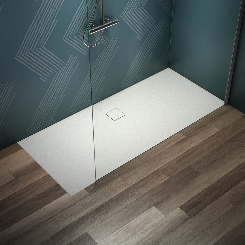 Immagine di Ideal Standard ULTRA FLAT EVO piatto doccia rettangolare L.180 P.80 cm, installazione sopra pavimento o filo pavimento, in StoneTech, antiscivolo, con scarico sul lato lungo, colore bianco seta finitura opaco T5429FO