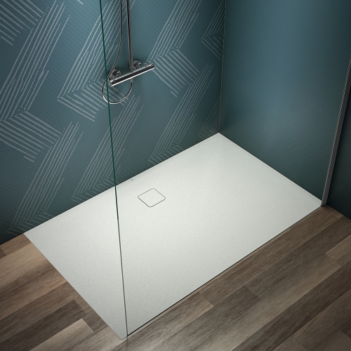 Immagine di Ideal Standard ULTRA FLAT EVO piatto doccia rettangolare L.160 P.100 cm, installazione sopra pavimento o filo pavimento, in StoneTech, antiscivolo, con scarico sul lato lungo, colore bianco seta finitura opaco T5533FO