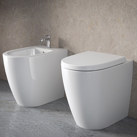 Immagine di Ideal Standard I.LIFE O set completo sanitari a terra vaso HydroTwist, sedile a discesa rallentata, bidet monoforo con troppopieno, colore bianco finitura lucido T568901+T569001+T572201