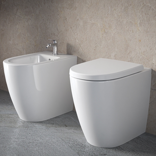 Immagine di Ideal Standard I.LIFE O set completo sanitari a terra vaso HydroTwist, sedile a discesa rallentata, bidet monoforo con troppopieno, colore bianco finitura lucido T568901+T569001+T572201