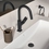 Immagine di Ideal Standard CERALIFE C miscelatore monocomando per lavabo, con doccetta estraibile, con piletta click-clack, colore nero finitura opaco BE056XG