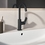 Immagine di Ideal Standard CERALIFE C miscelatore monocomando per lavabo, con bocca tubolare, con piletta click-clack, colore nero finitura opaco BE054XG