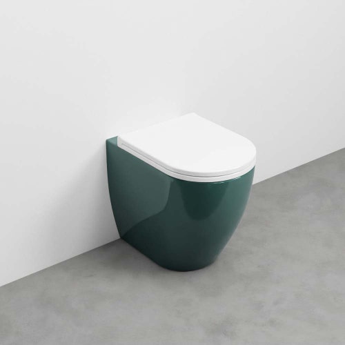 Immagine di Cielo SMILE MINI 48 set sanitari a terra, vaso con scarico a terra, coprivaso in termoindurente frizionato, e bidet monoforo, colore smeraldo finitura lucido SMVASRSM+CPVSMFSM+SMBIDRSM